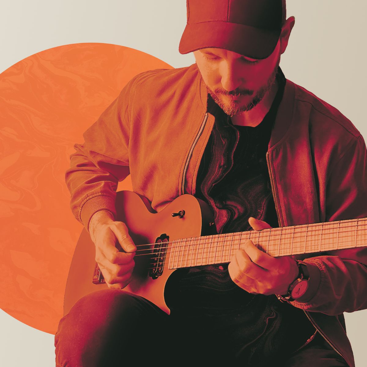 Victor playing guitar.